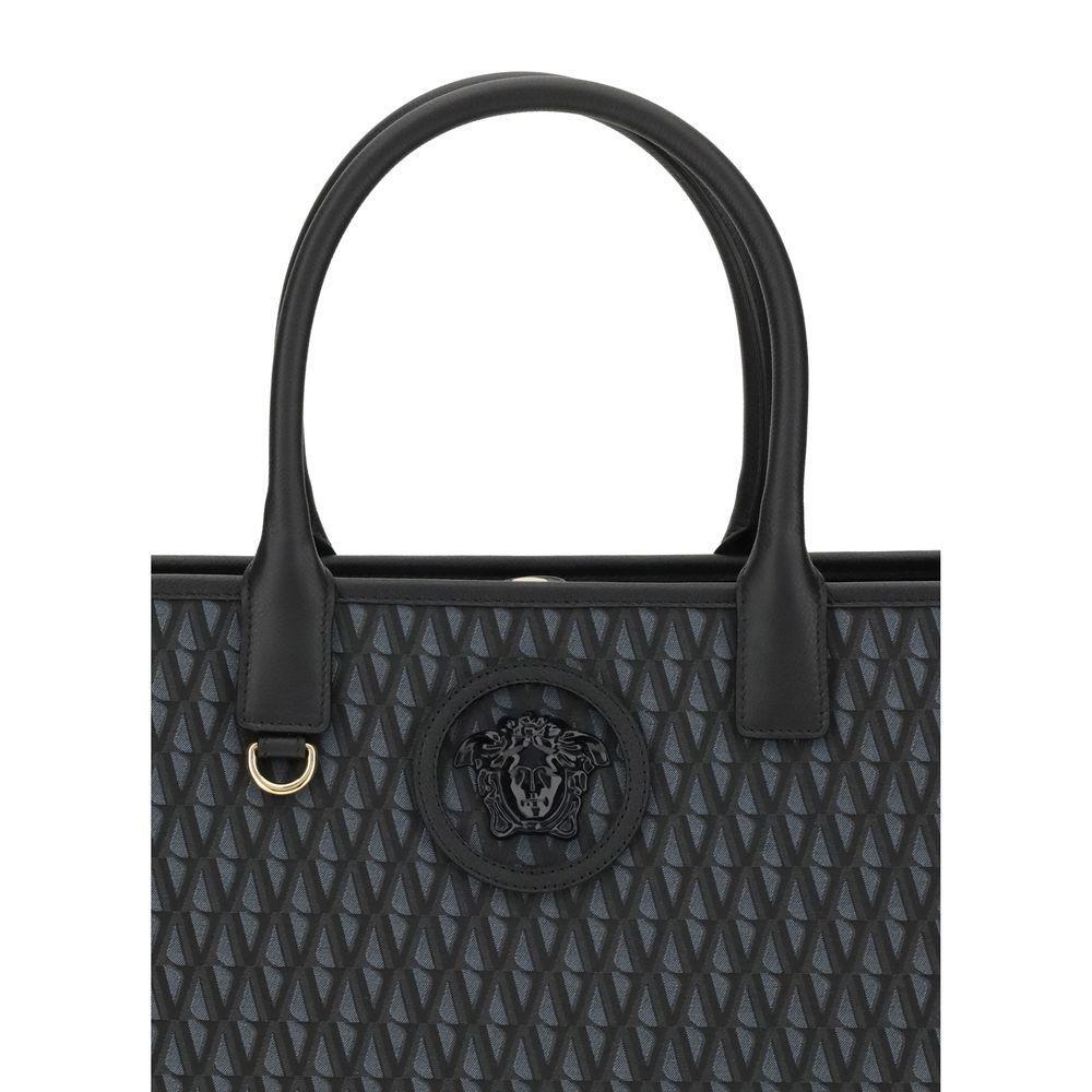 Front view with bag zipped and handles upright.