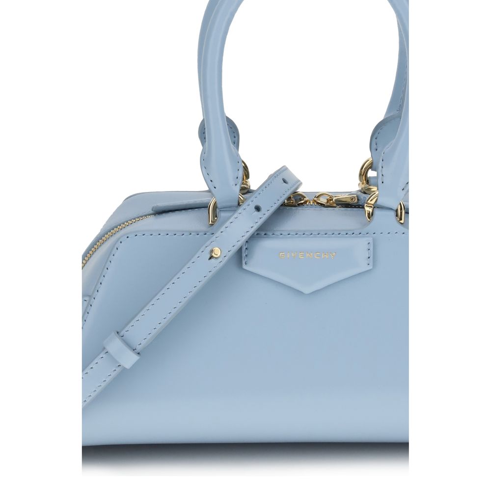 Givenchy Light Blue Calf Leather Bos Taurus Handbag with gold finishes and embossed logo.