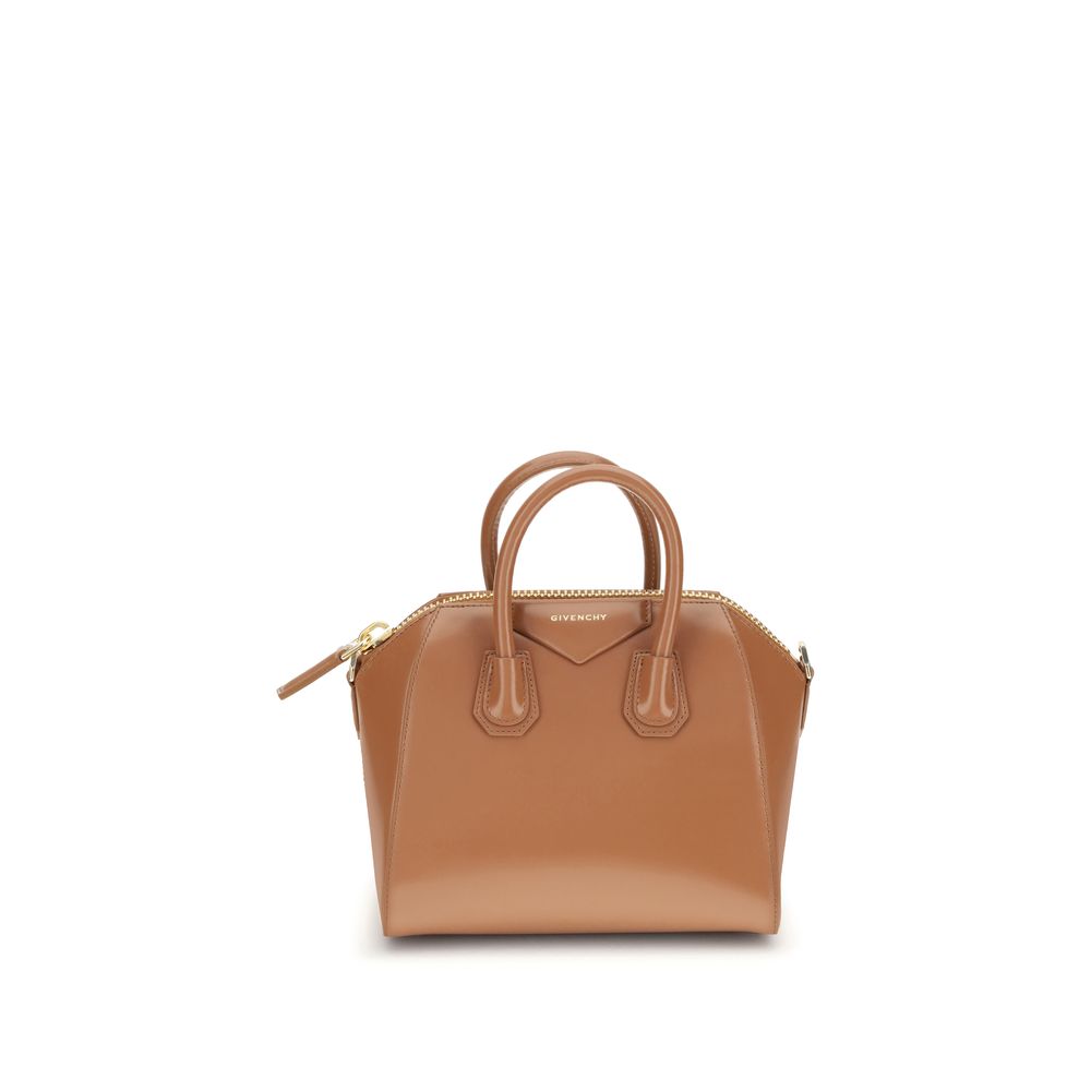 Givenchy Brown Calf Leather Bos Taurus Handbag with geometric design, shiny leather, double-slider zipper, and adjustable shoulder strap.