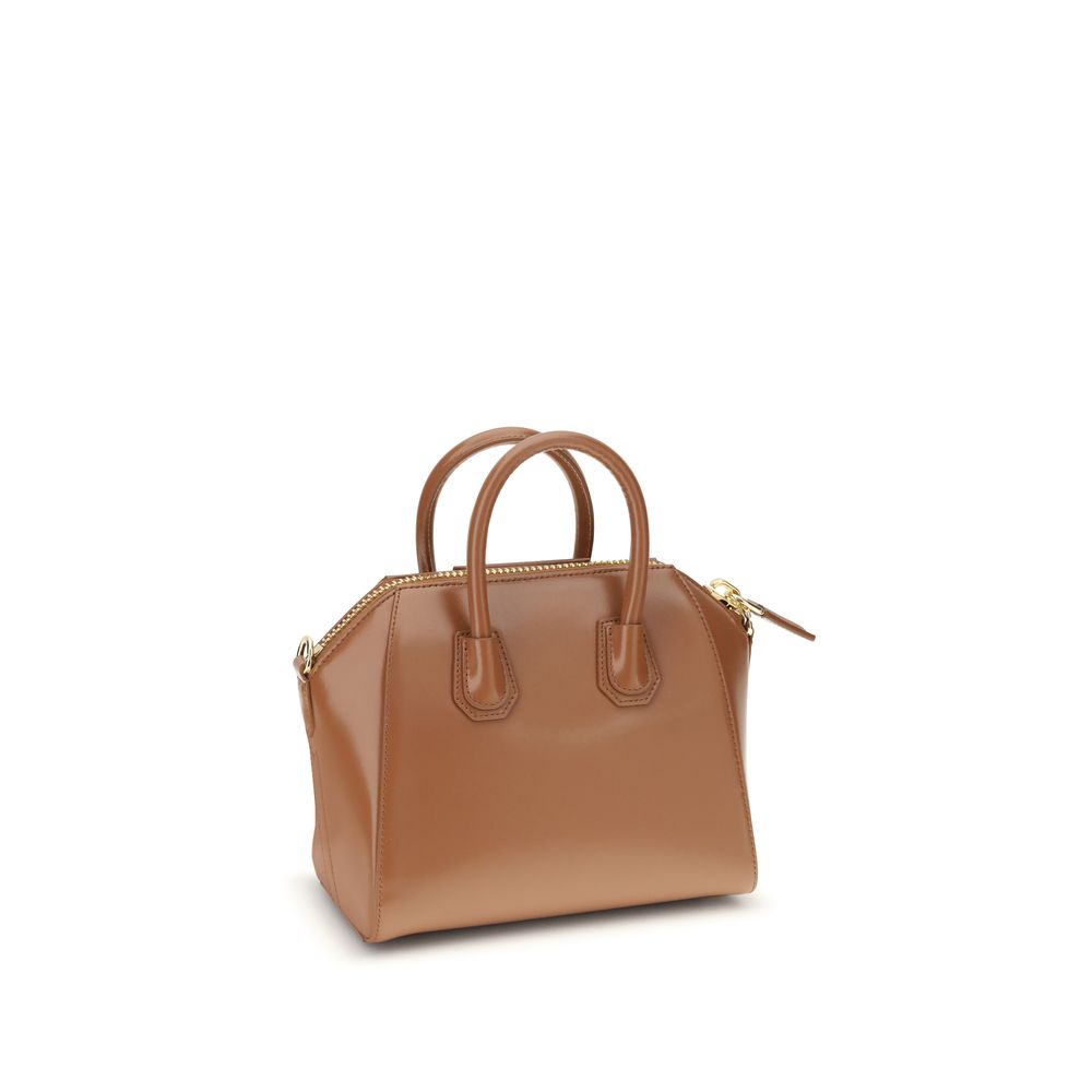 Givenchy Brown Calf Leather Bos Taurus Handbag with geometric design, featuring a shiny leather finish and iconic monogram.