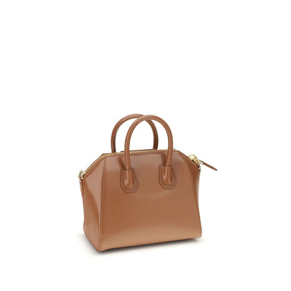 Givenchy Brown Calf Leather Bos Taurus Handbag with geometric design, featuring a shiny leather finish and iconic monogram.