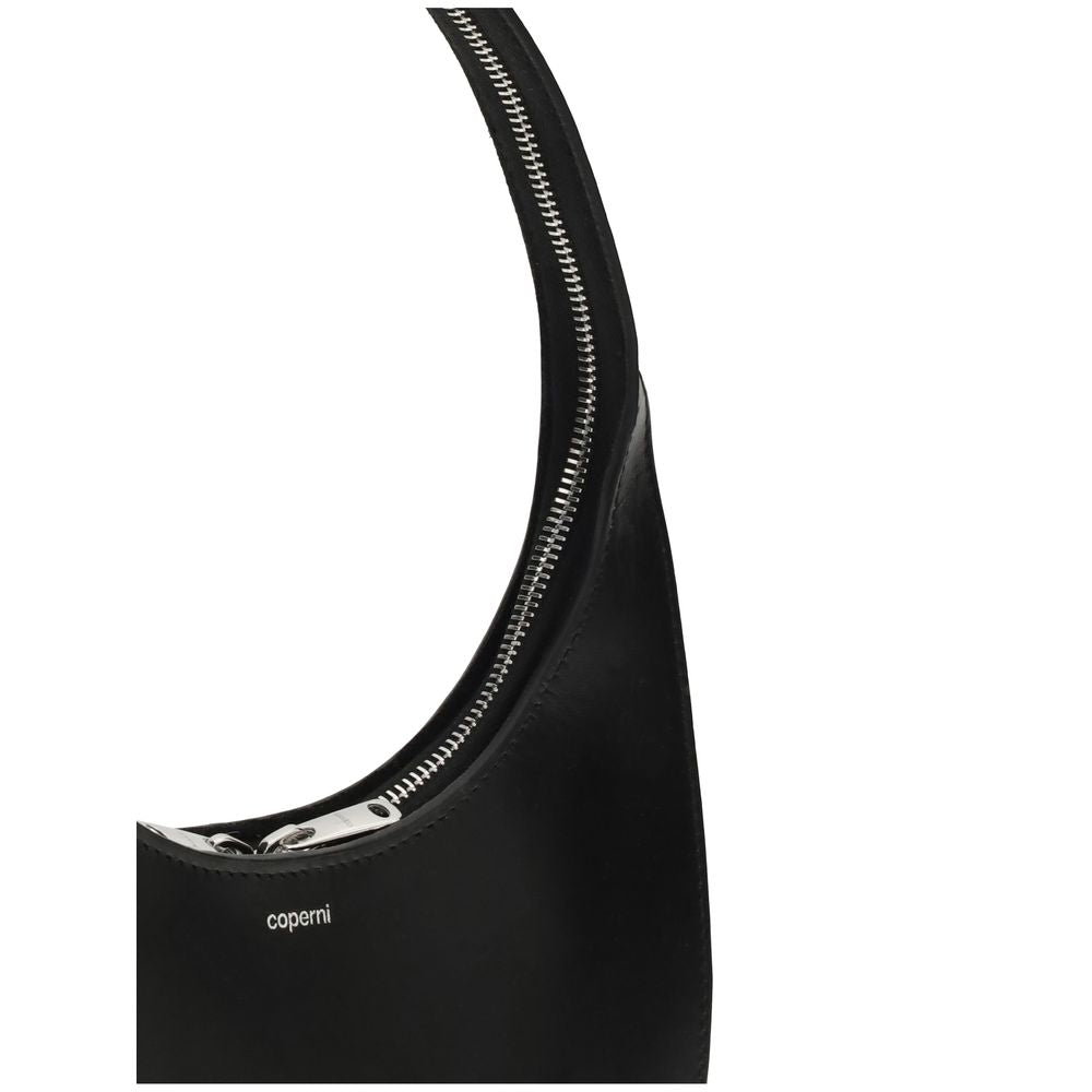 Detail view of Coperni Black Leather Shoulder Bag with silver-tone zip and embossed logo, AW25 collection.