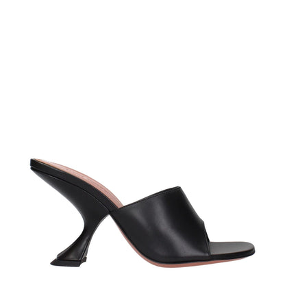 Amina Muaddi Black Leather Stiletto Heel Sandals, side view showcasing unique heel design and sleek leather finish.