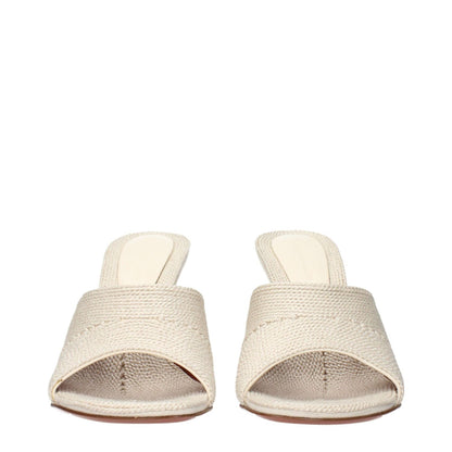 Amina Muaddi Beige Fabric Slippers front view showcasing woven texture in beige, elegant design, and open-toe style.