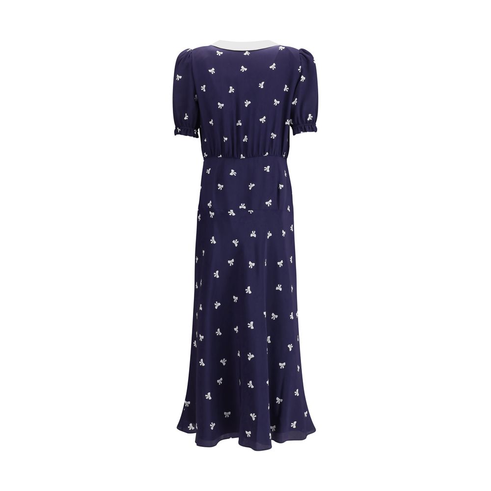 Back view of Alessandra Rich Blue Silk Casual Dress with bow pattern and puff sleeves for a vintage-inspired look.