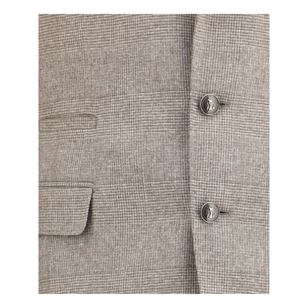 Brunello Cucinelli Beige Silk Two-Piece Suit close-up of blazer buttons and pocket design, showcasing elegance and luxury.