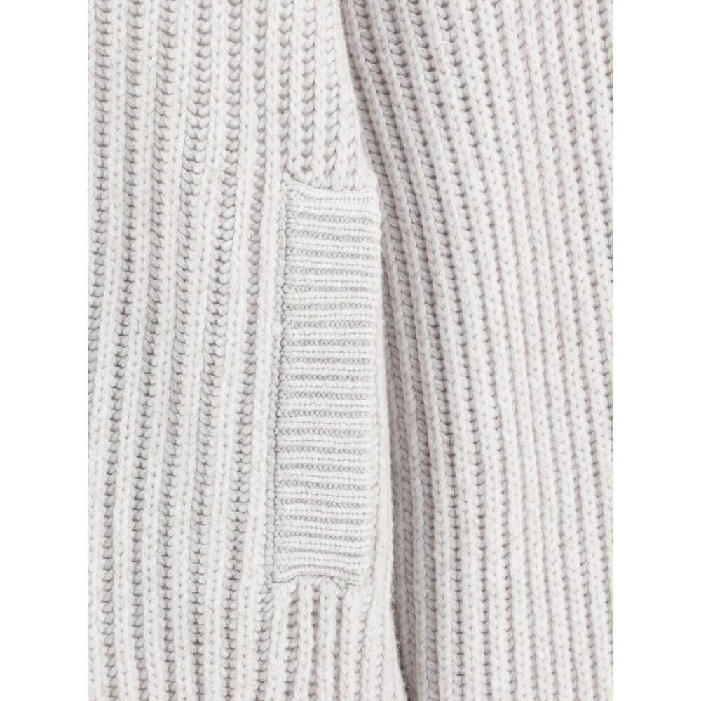 Close-up of Brunello Cucinelli White Cashmere Cardigan ribbed texture and welt pocket detail.