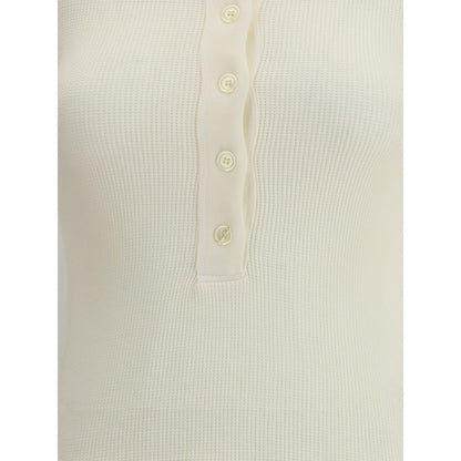 Close-up of Citizens of Humanity White Cotton Top with ribbed texture and button closure.