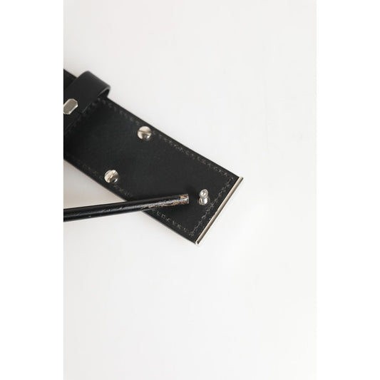 Close-up of Dolce & Gabbana Black Leather Classic Metal Logo Buckle Belt showing minor defect with replaced missing screws.