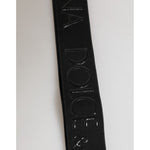 Detail of Dolce & Gabbana Black Polyester Stretch Rubberised DG Logo Men Keychain showing embossed logo on strap.