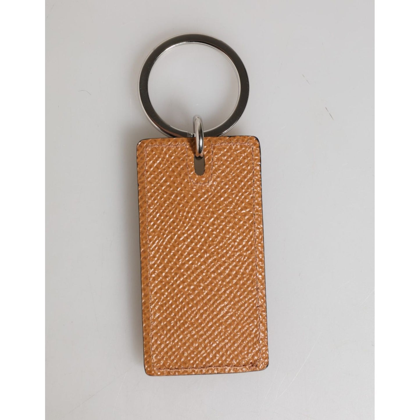 Dolce & Gabbana Brown Leather Logo Metal Ring Keychain Holder Men Keyring with silver detailing and logo engraved metal hardware.