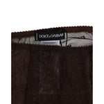 Dolce & Gabbana Brown Nylon Logo Lace Leggings Pants Underwear tag detail, highlighting luxurious design and brand logo.