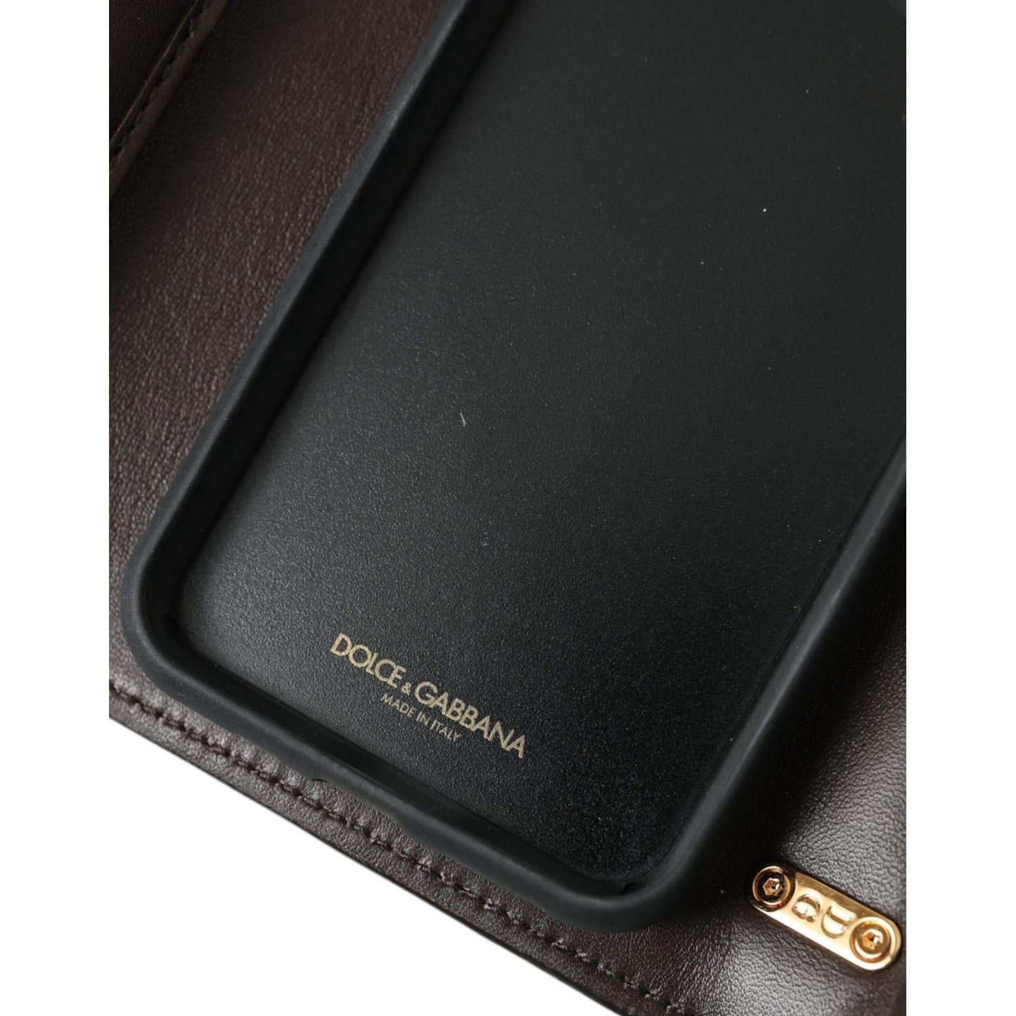 Inside view of Dolce & Gabbana Brown Python Leather DG Girls Crossbody Phone Bag showing leather lining and brand logo.