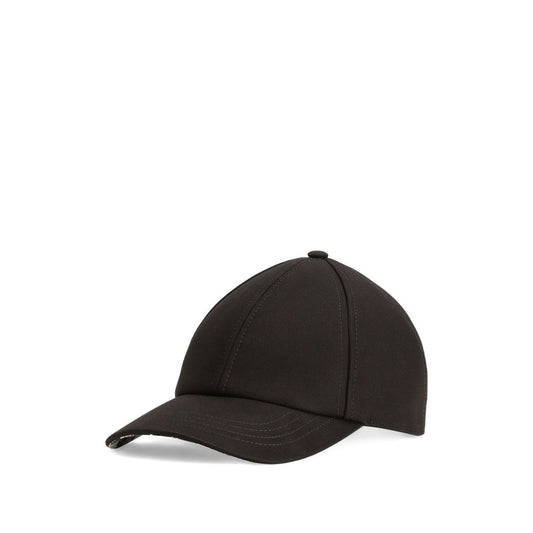 Dolce & Gabbana Cotton baseball cap in black with tonal stitching, curved brim, and adjustable strap with logo detailing at the back.