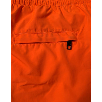 Dolce & Gabbana Orange Polyester Beachwear Shorts 2Pc Swimwear with zip-fastening rear pocket detail.