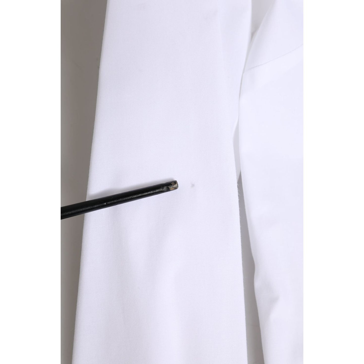 Close-up of sleeve detailing on Dolce & Gabbana White Cotton Collared Buttoned Dress Shirt Top.