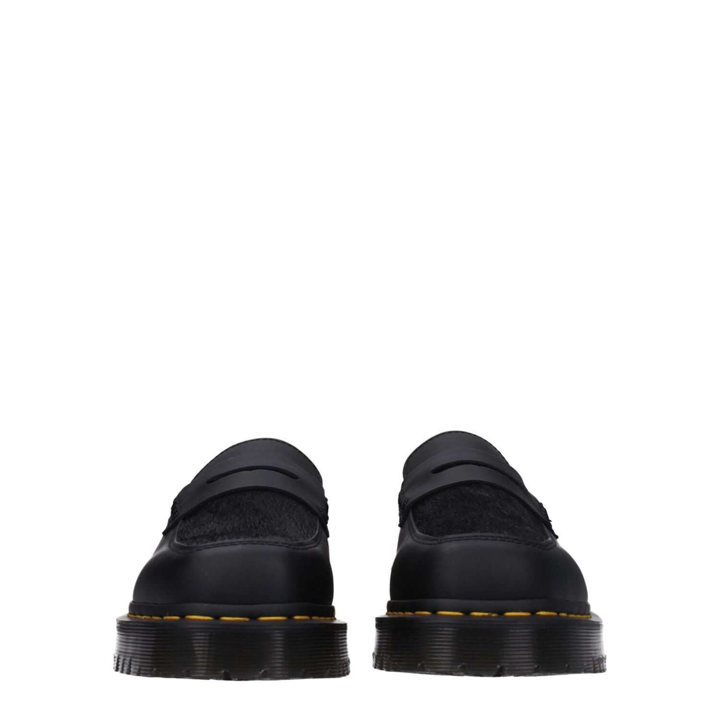 Dr. Martens Black Leather Slip-On Loafers with rubber sole and square toe, showing front view of black leather casual style.