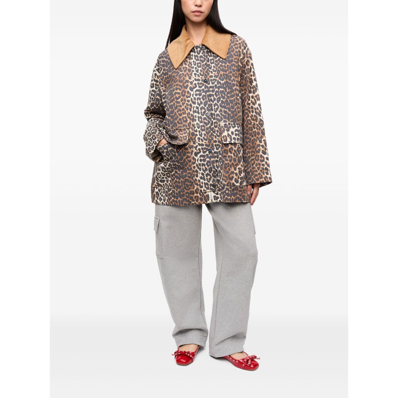 GANNI Jackets Brown animal print cotton blend jacket with wide peak lapels and front button fastening, worn by model.