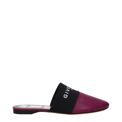 Side view of Givenchy Purple Leather Slippers featuring front logo, round toe, and low heel, crafted in violet leather.
