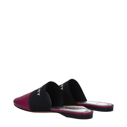 Givenchy Purple Leather Slippers with logo, low flat heel, round toe, and dark orchid color accents.