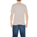 Back view of a model wearing a Hamaki-Ho Beige Cotton Sweater, showcasing short sleeves and crew neck design for men.
