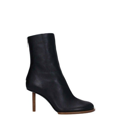 Jacquemus Black Leather Ankle Boots with high heel and square toe, featuring a zip closure. Casual style with an 8 cm leather heel.