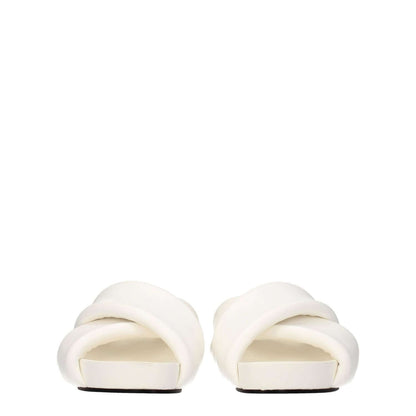Jil Sander White Leather Slippers featuring open toe design, vintage effect, and mid heels; perfect casual style footwear.