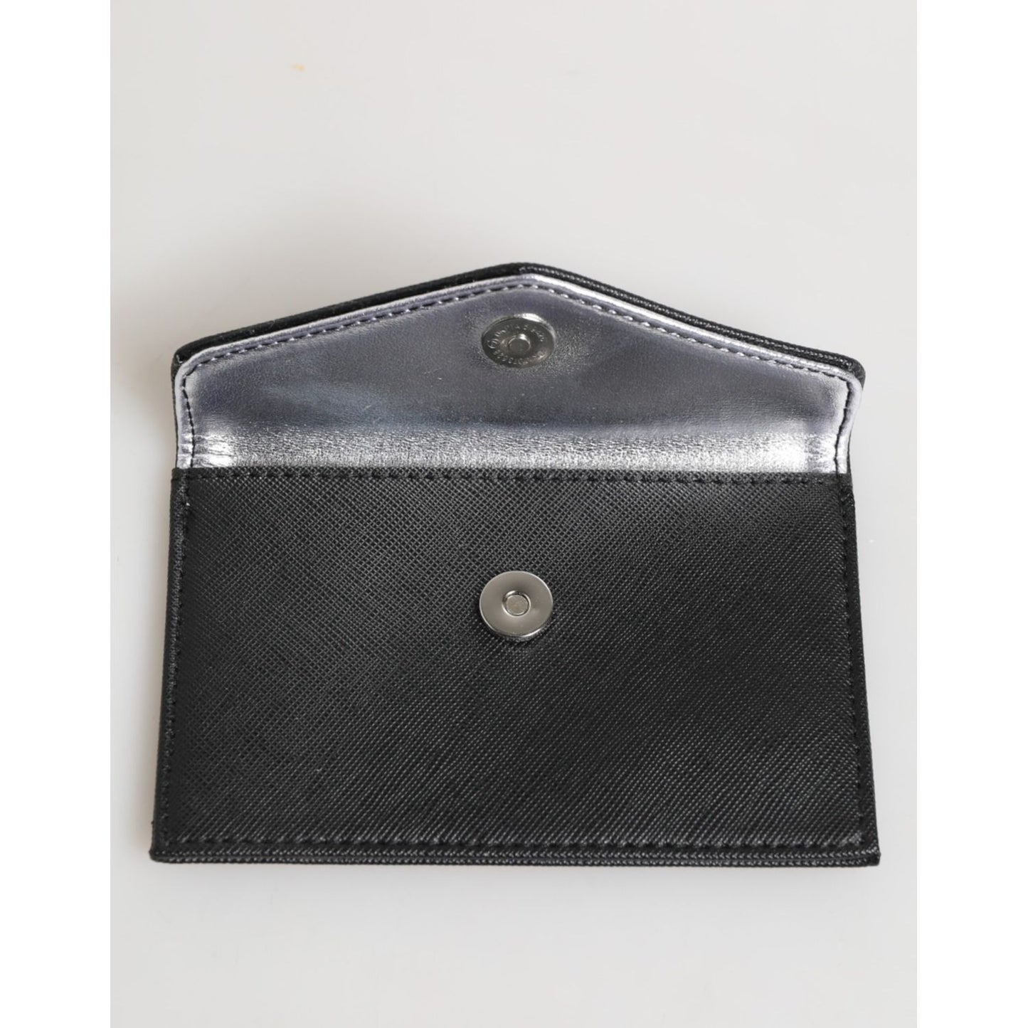 Michael Kors Black Saffiano Leather Envelope Holder Men's Accessory Wallet, open with visible metal snap closure and interior.