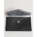 Michael Kors Black Saffiano Leather Envelope Holder Men's Accessory Wallet, open with visible metal snap closure and interior.