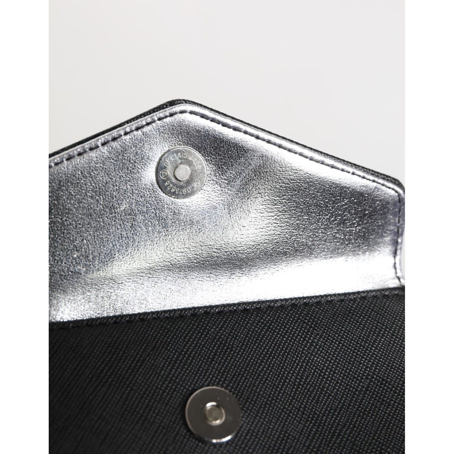 Interior view of Michael Kors Black Saffiano Leather Envelope Holder Men's Accessory Wallet with metal snap closure