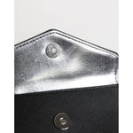 Interior view of Michael Kors Black Saffiano Leather Envelope Holder Men's Accessory Wallet with metal snap closure