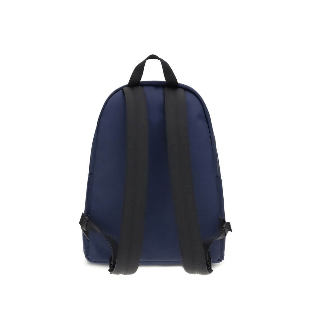 Moncler Blue Nylon Backpack showcasing adjustable straps and leather handle for style and comfort.