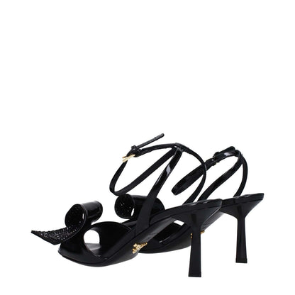 Prada Black Leather Stiletto Heel Sandals with buckle closure and open toe, featuring a mid heel and side detail.