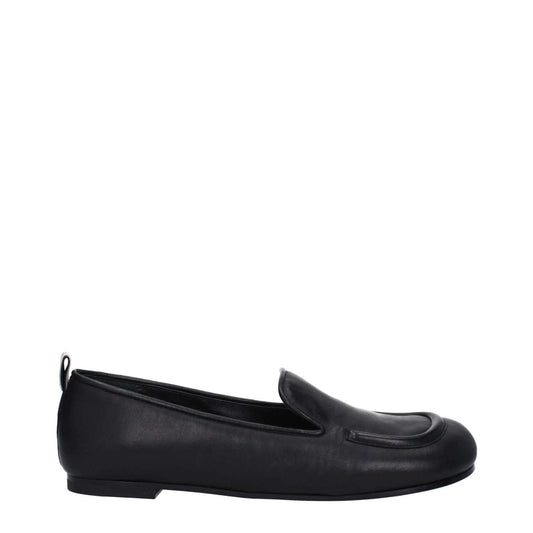 Premiata Black Leather Slip-On Loafers with back logo, round toe, and low flat heel.