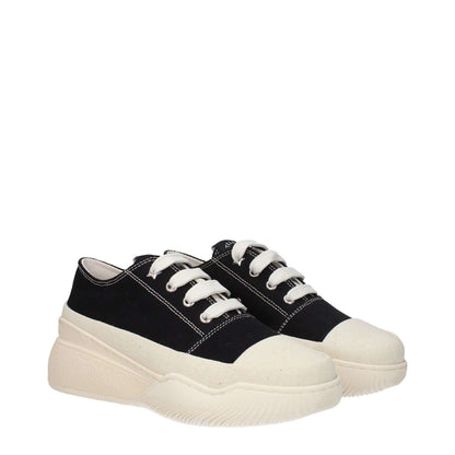 Stella McCartney Black Fabric Chunky Sneakers with lace-up closure, round toe, and rubber sole. Wedge height: 5 cm, mid heels.