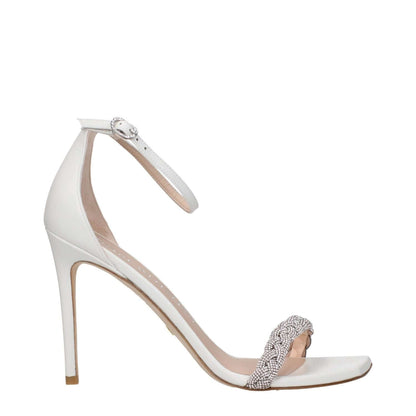 Stuart Weitzman White Leather Stiletto Heel Sandals with rhinestone strap and buckle closure, side profile view.