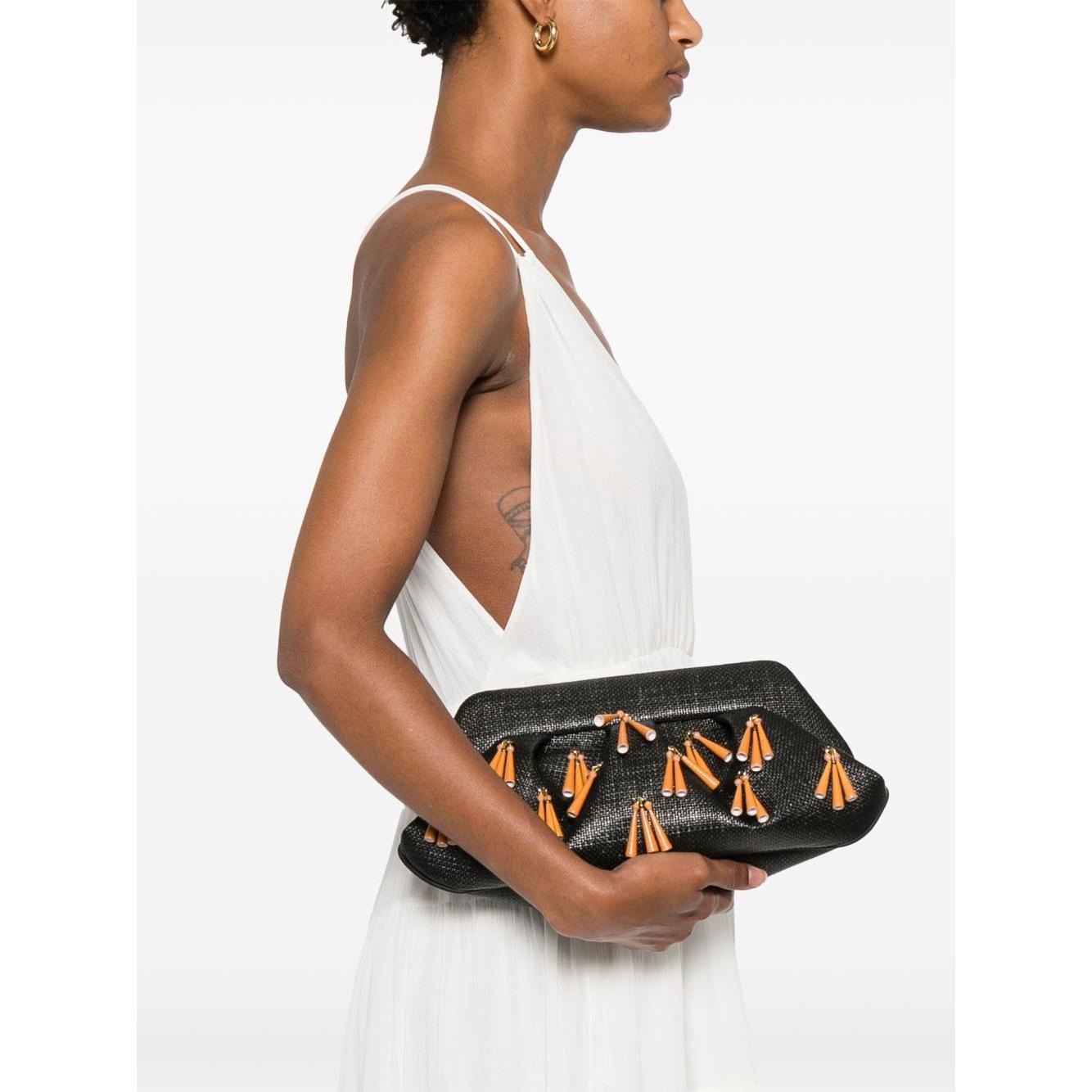 Front view with bag zipped and handles upright.