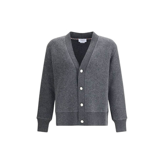 Thom Browne Gray Wool Cardigan with v-neck, button closure, and ribbed cuffs and hem. 100% wool, ideal for a sophisticated touch to your wardrobe.