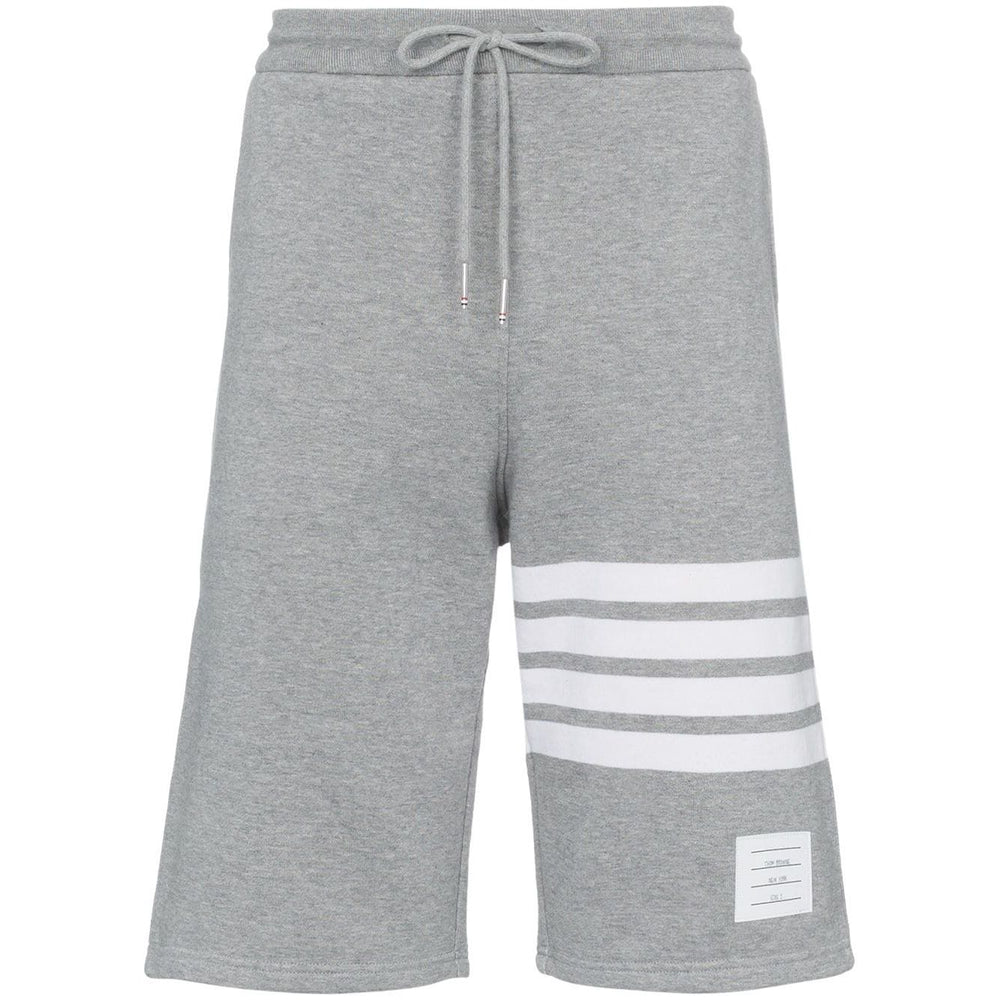 Thom Browne Shorts Light Grey with 4-Bar stripe, grosgrain ribbon trim, elastic waistband, perfect fit cotton jersey.