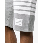 Thom Browne Shorts Light Grey featuring 4-Bar stripe and grosgrain ribbon trim, cotton jersey knit fabric with elasticated waistband.
