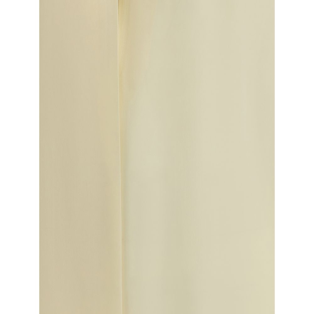 Close-up of Tom Ford Cream Silk Blouse fabric texture showcasing elegant and sensual design.