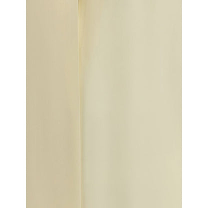 Close-up of Tom Ford Cream Silk Blouse fabric texture showcasing elegant and sensual design.