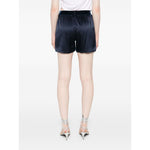 Rear view of model wearing navy blue Tom Ford Shorts Blue with elasticated and logo waistband, silk material, true to size fit.