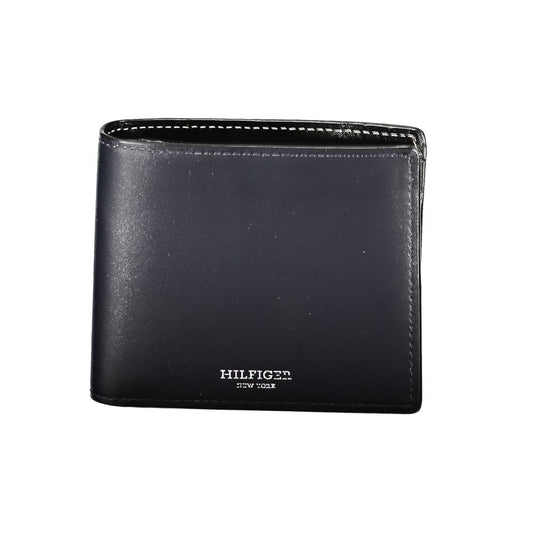 Tommy Hilfiger Blue Leather Wallet with two compartments, coin purse, card holder, contrast details, and logo highlighting.