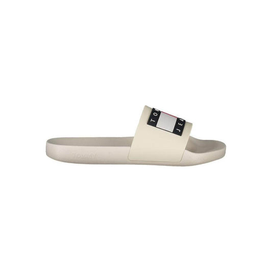 Tommy Hilfiger beige men's sandal with logo, polyethylene, side view, casual and luxury footwear.