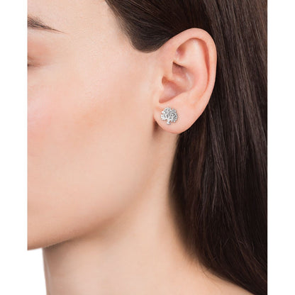 Woman wearing VICEROY JEWELS Mod. 5101E000-30 silver earrings, 925 Silver, multifaceted design, displayed on ear, elegant accessory.