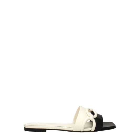 Valentino Garavani Black Leather Slippers with ivory accents, open toe, and flat heel, perfect for casual style.