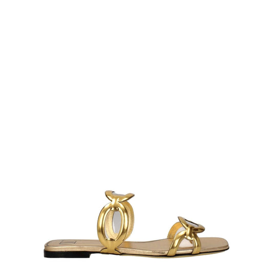 Valentino Garavani Gold Leather Slippers, casual open-toe footwear in gold leather, low flat heel. MPN S0GK2NHEV3L.