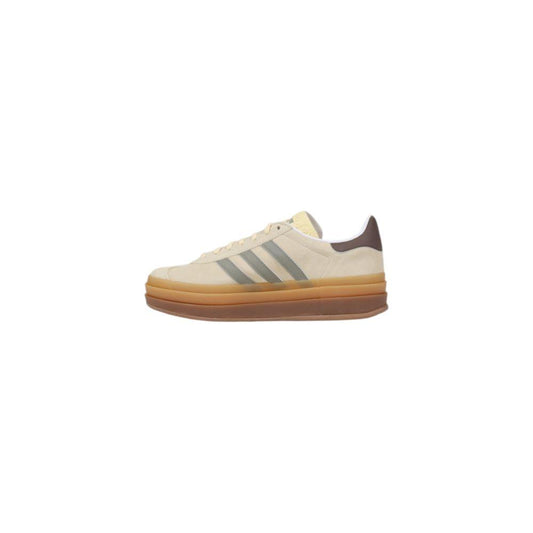 Side view of Adidas Gazelle Bold W cream suede leather sneaker with thick sole and iconic design.